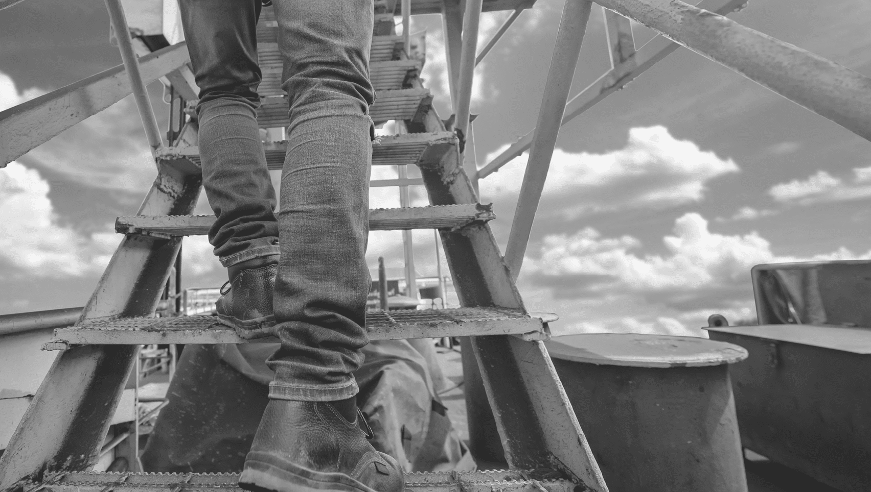 worker, engineering wearing safety shoe with set of safety and security regulation, walking in mind step on the steel gangway bridge at workplace, working in high stage & level of insurance