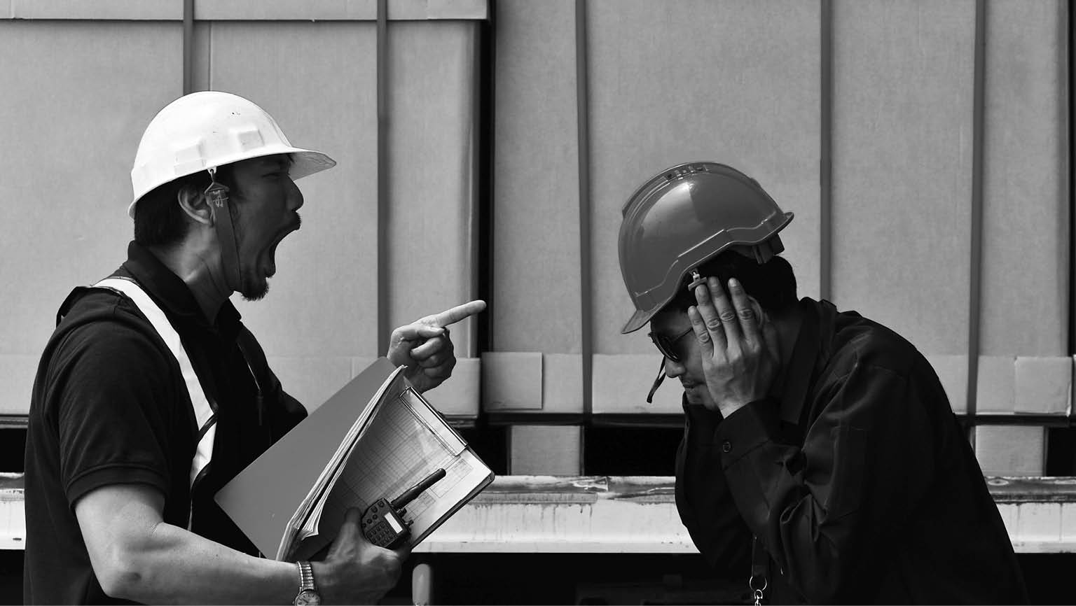 Angry foreman claiming and shouting to an truck driver 