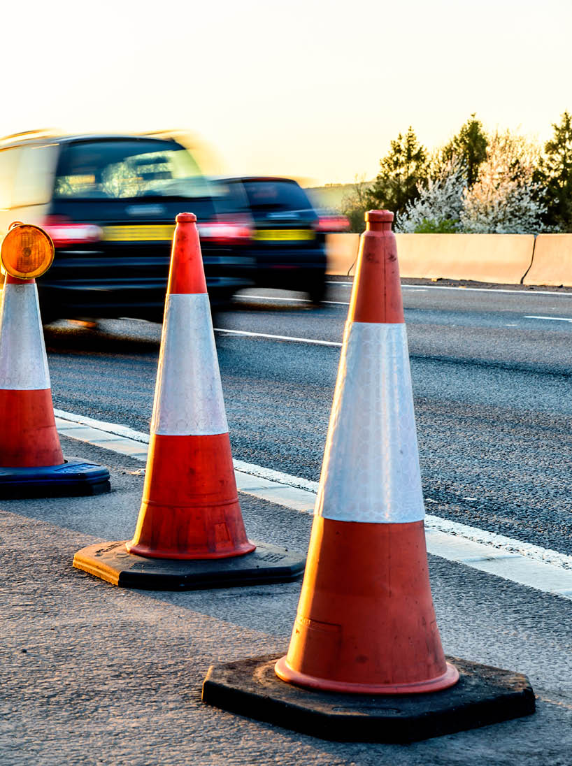 Evening view UK Motorway Services Roadworks Cones